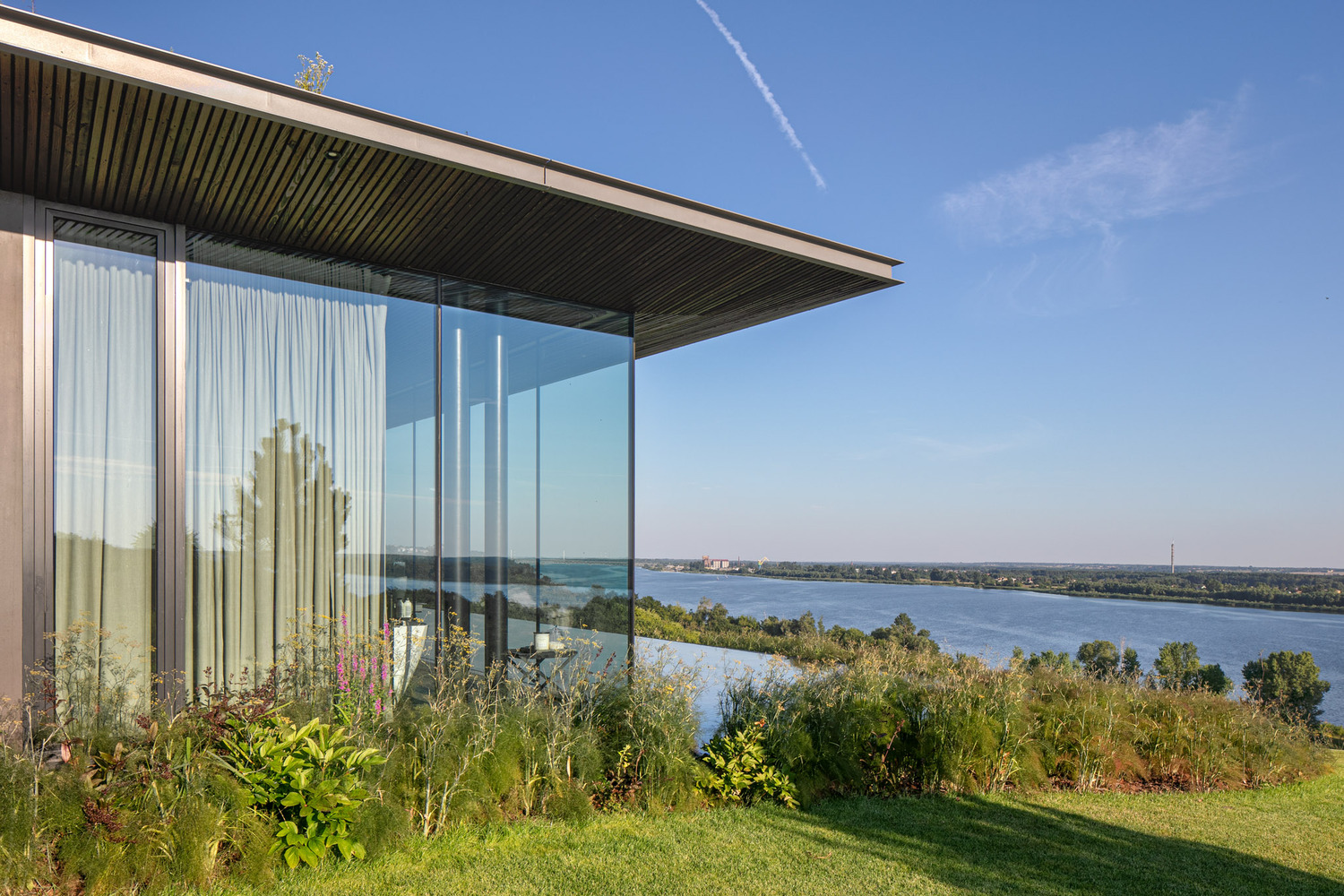 35 35 slope house 77 studio architecture poland glass walls